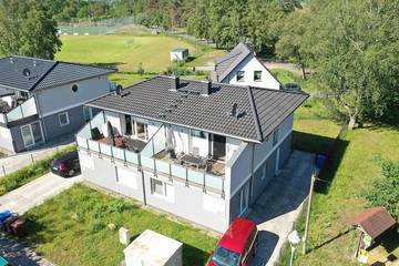 Ferienhaus für 6 Personen, mit Balkon und Pool sowie Sauna und Garten in Göhren