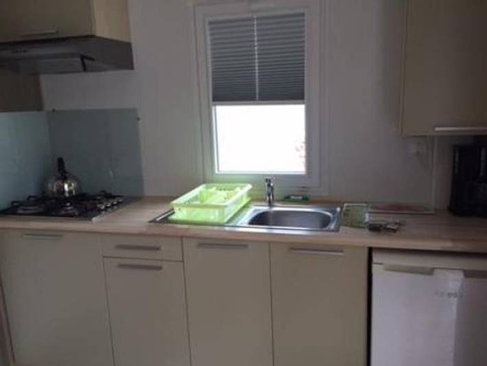 Camping Les Catalpas - Mobilheim 2 personen - H 28G Clim Conf 1 ch Ideal Paar Bett 160 in Fumel, Quercy