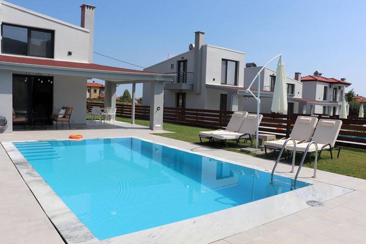 Resort per 6 persone, con Balcone e Terrazza nonché Giardino e Piscina in Grecia