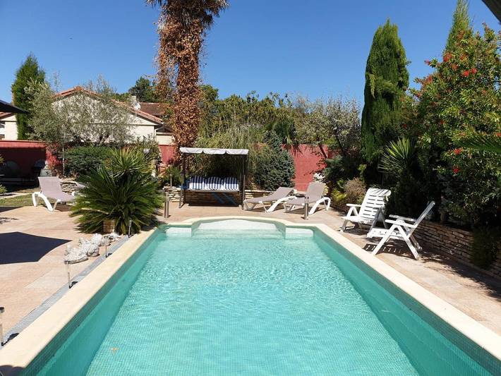 Appartement de vacances pour 4 personnes, avec Balcon et Terrasse ainsi que Jardin et Piscine