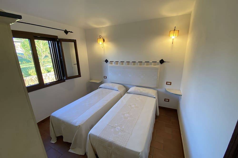 Casa Omar: Villa con Parco Giochi, Cucina Esterna e Ac – 900m dal Mare in Porto Ainu, Tanaunella