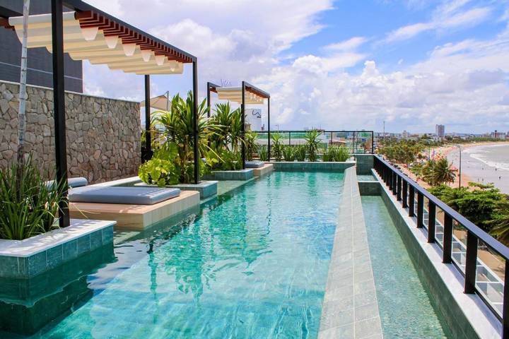 Casas e apartamentos de temporada para 3 pessoas, com piscina e vista e ainda jardim em Bessa
