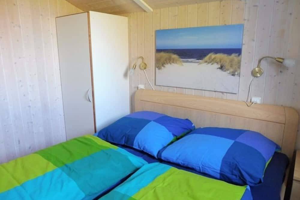 Ganze Wohnung, Ferienwohnung 'Ferienhaus Ty Glaz' mit gemeinsamer Terrasse, gemeinsamem Garten und Wi-Fi in Wesselburenerkoog, Dithmarschen