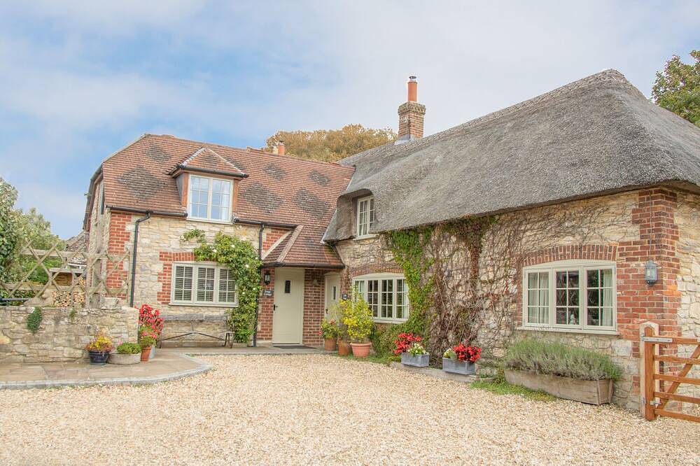 Forge Cottage, pet friendly, with a garden in West Lulworth in Lulworth Cove, Dorset