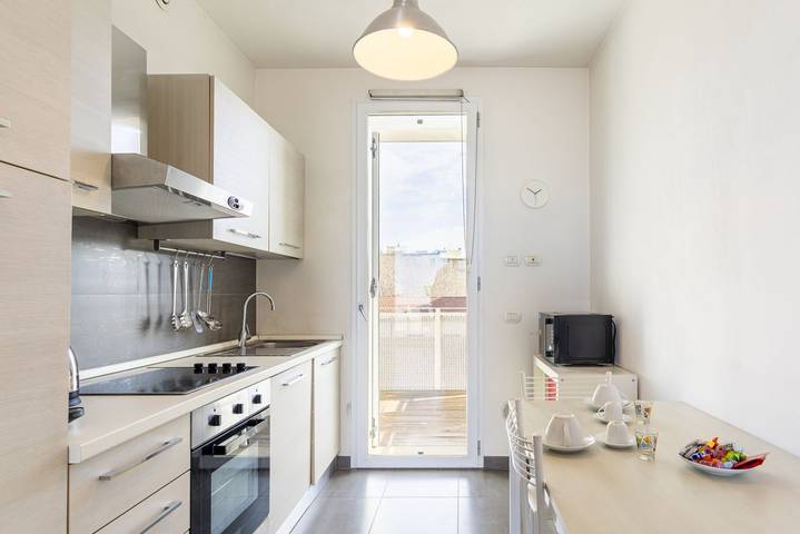 Entire apartment, Guesthost - Bright Balcony Apt with Sea-View in Livorno, Etruscan Coast