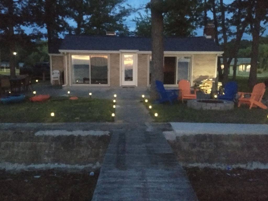 Private Lakefront Cottage with 90' of sandy East Bay frontage on Houghton Lake in Prudenville, Roscommon County