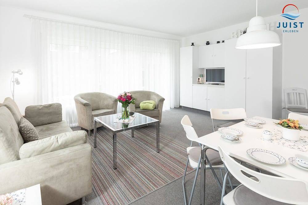 Freundliche helle Ferienwohnung, ideal für Paare, mit Südterrasse im Ostdorf