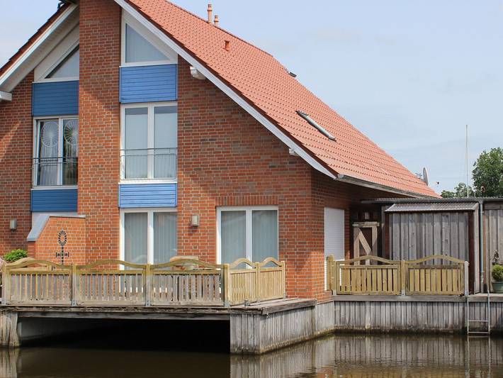 Ferienwohnung für 5 Personen, mit Balkon/Terrasse und Terrasse sowie Seeblick in Weener