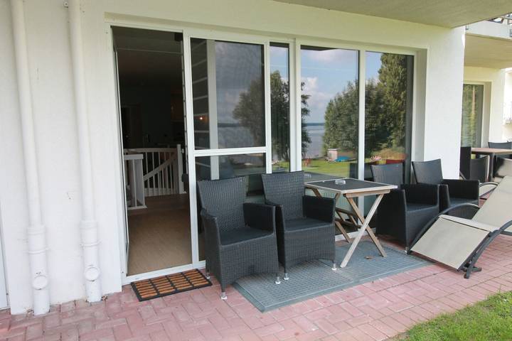 Ferienwohnung für 4 Personen, mit Terrasse und Garten sowie Seeblick - 1