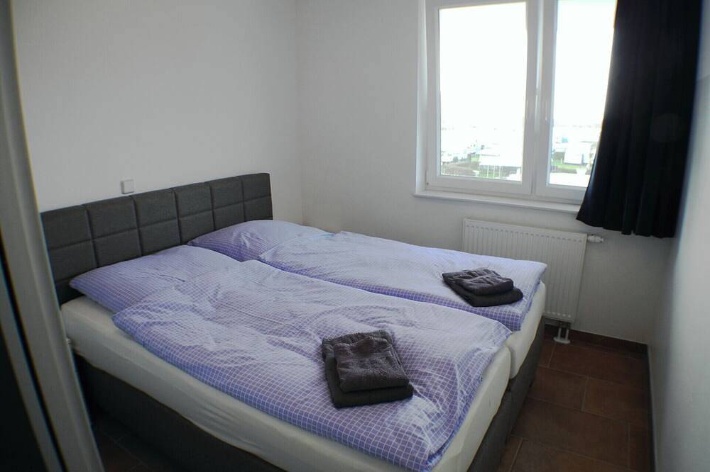 Ganze Wohnung, Hochwertige Ferienwohnung mit Kamin und Wellnessdusche wenige Meter zum Strand in Großenbrode, Ostholstein