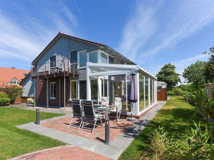 Ferienwohnung für 5 Personen, mit Terrasse und Garten sowie Sauna in Holtgast