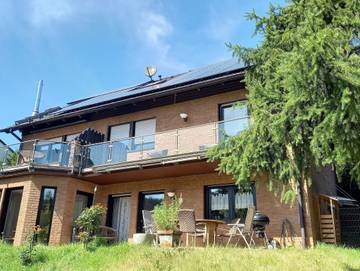 Ferienwohnung für 5 Personen, mit Balkon und Garten sowie Ausblick in Mossautal