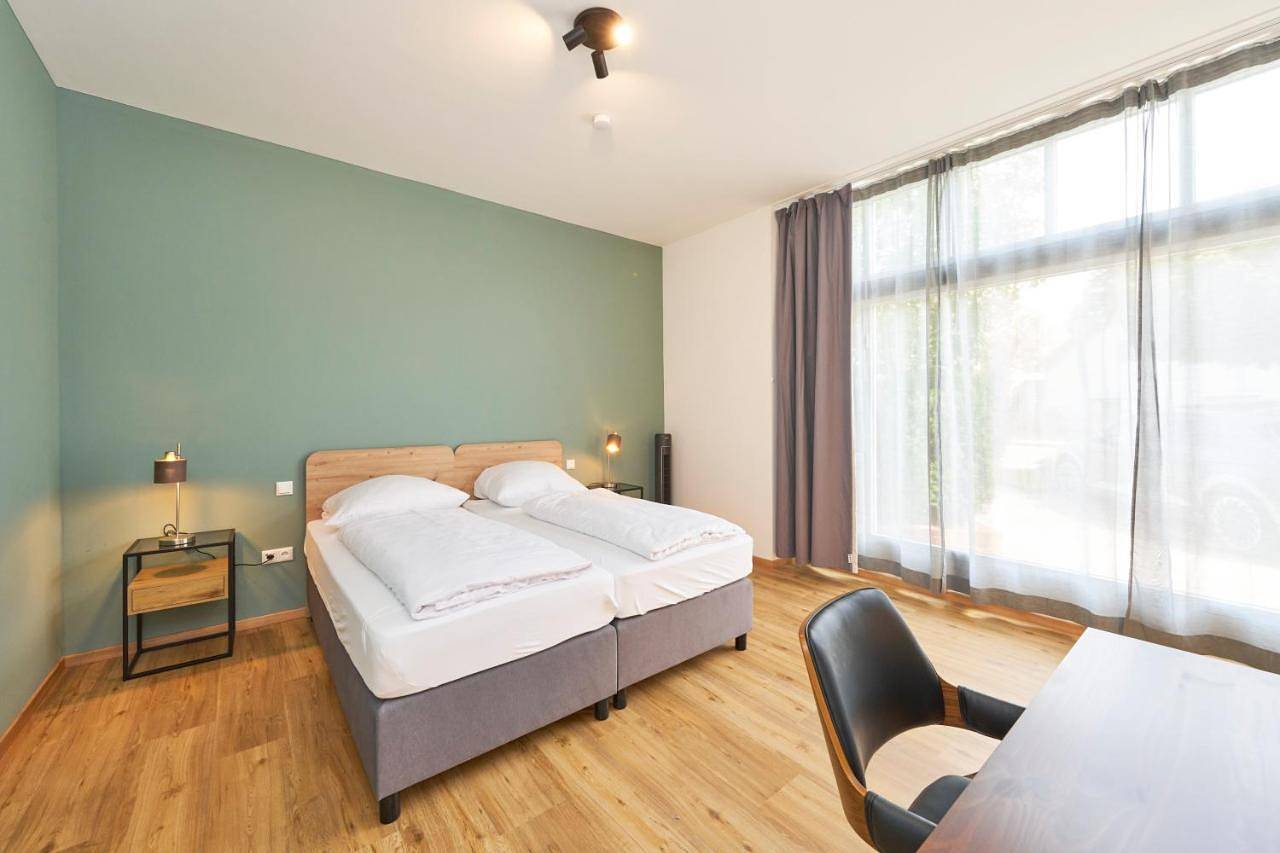Appartement entier, Cozee - Moderne Design-Apartments I Parkplatz I Ideal für München & Flughafen Muc in Ismaning, Haute-Bavière