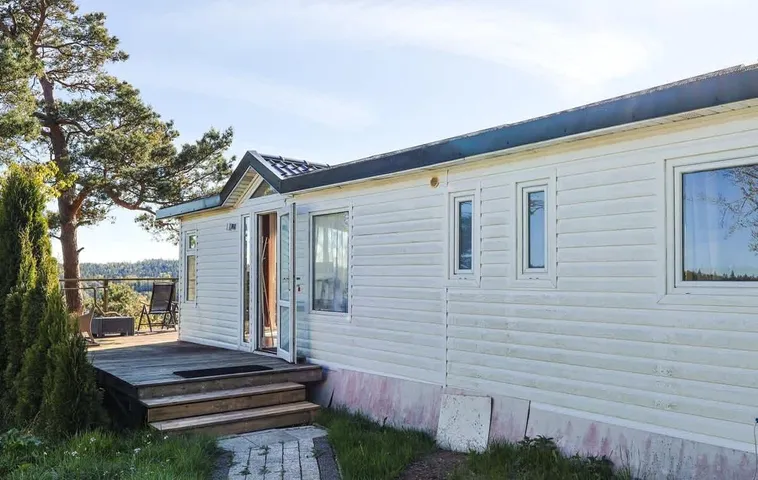 Ferienhaus für 3 Personen, mit Terrasse und Seeblick sowie Garten - 1