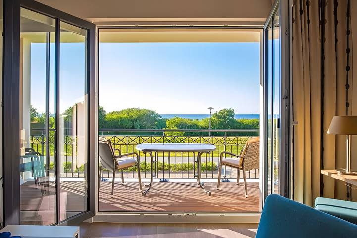 Ferienwohnung für 4 Personen, mit Balkon und Sauna sowie Seeblick in Börgerende-Rethwisch