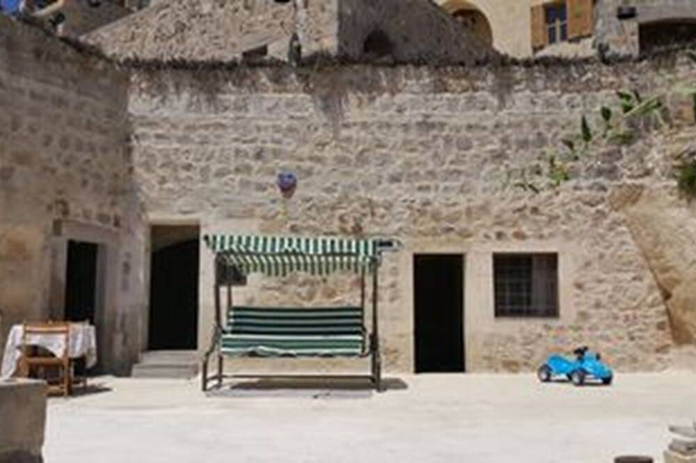 Cave accommodation in Cappadocia with stunning views over valleys and Mt. Argeus in Uçhisar, Nevsehir