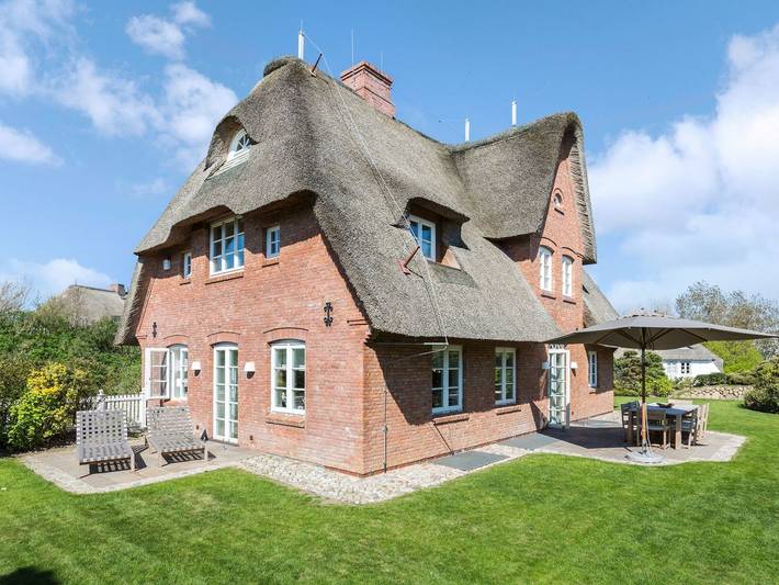 Ferienhaus mit Meerblick für 8 Personen, mit Terrasse und Garten sowie Sauna