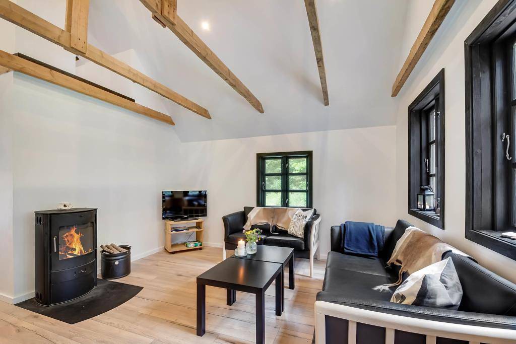 Modernised holiday home with woodburning stove, whirlpool and great wooden terrace in Vester Husby, Husby