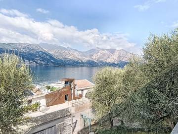 Ferienhaus für 4 Personen, mit Seeblick und Terrasse sowie Garten, mit Haustier am Gardasee