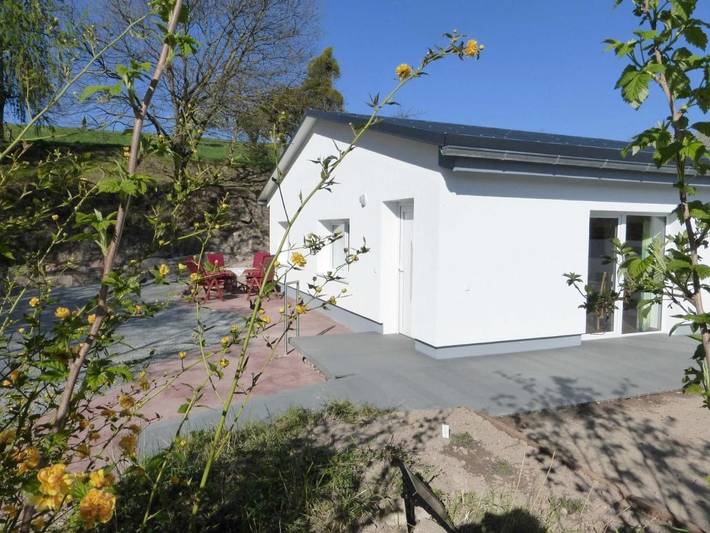 Ferienwohnung für 4 Personen, mit Terrasse und Garten sowie Ausblick