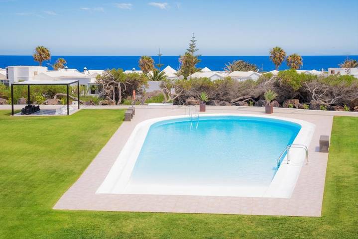 Location de vacances pour 4 personnes, avec vue ainsi que jardin et piscine dans Charco del Palo - 3