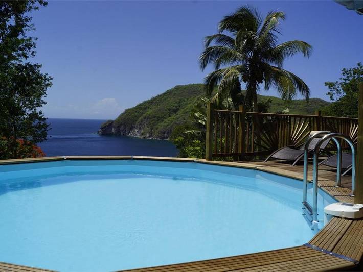 Villa pour 4 personnes, avec vue ainsi que jardin et piscine à Deshaies