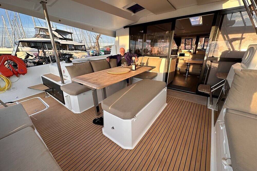 Eden modern catamaran for 2 to 8 p. at the dock in Porquerolles