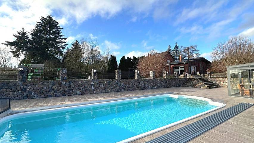 Ferienhaus für 7 Personen, mit Pool und Garten sowie Sauna und Whirlpool in Dolgen am See