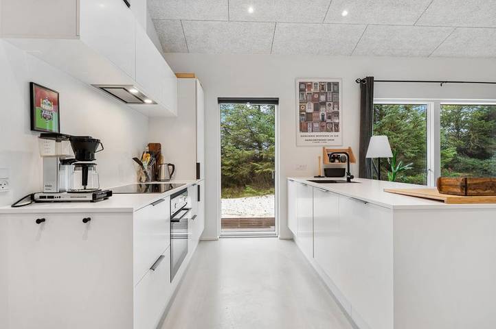 Activity holiday home with outdoor sauna and hot tub in Bjerregård, Holmsland Klit