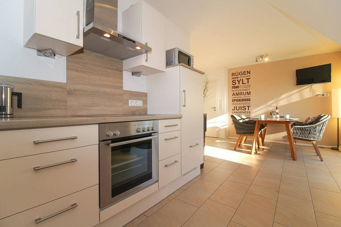Geheel vakantieappartement, Vakantieappartement voor 4 personen met balkon in Norden, Norden en omgeving