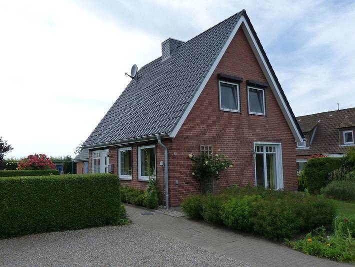 Ferienhaus mit Meerblick für 4 Personen, mit Garten