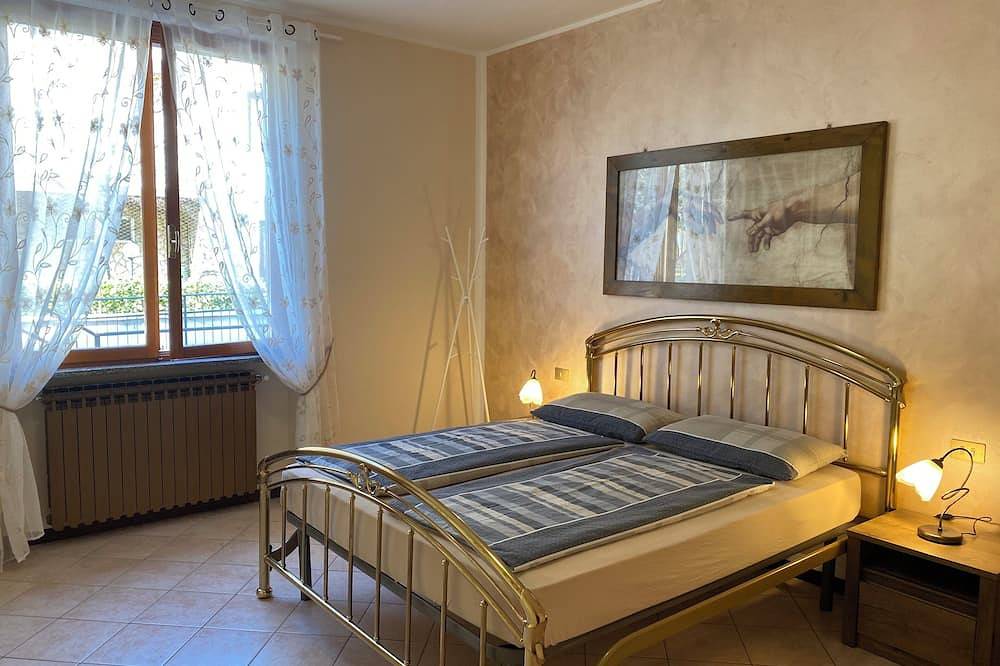 Groot huis, tuin, 5 personen, 200m van het meer / strand in Anfo, Garda Bergen