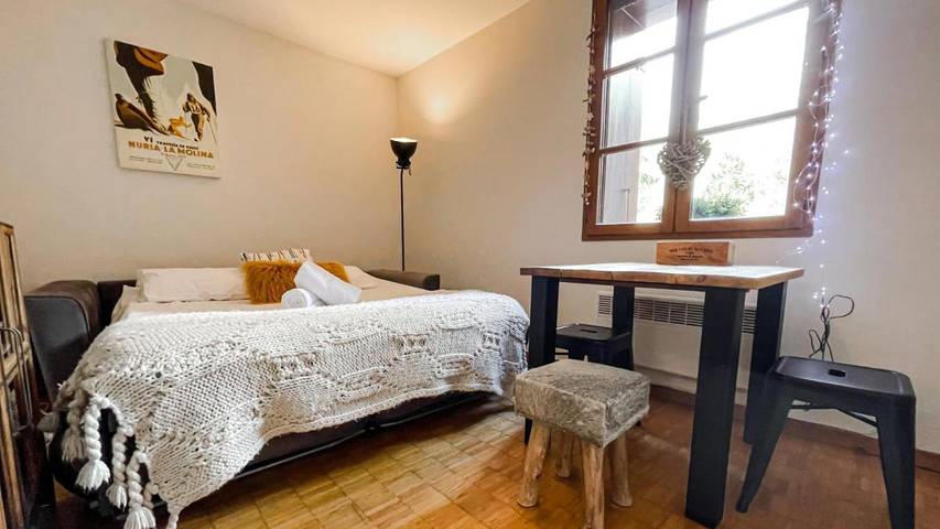 Appartement de vacances pour 2 personnes, avec sauna et jardin ainsi que vue et piscine