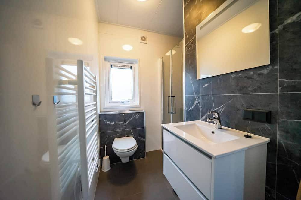 Chalet mit 2 Schlafzimmern und einer Geschirrspülmaschine in Eijerland, Westfriesische Inseln