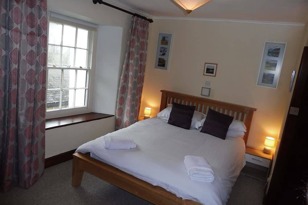 Windermere Zentrum. 3 Bedroom Grade 2 Listed Cottage mit einem Holzofen in Windermere, Lake District