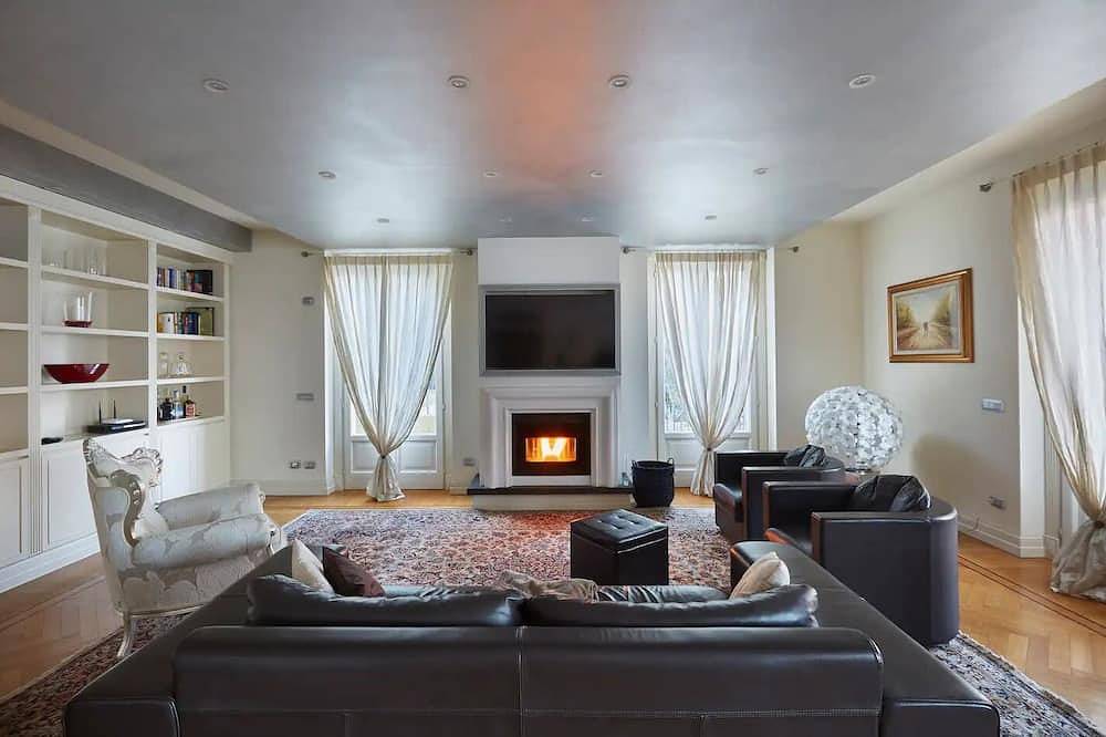 Perched above the gleaming waters of Lake Como in Riva (Faggeto Lario), Faggeto Lario