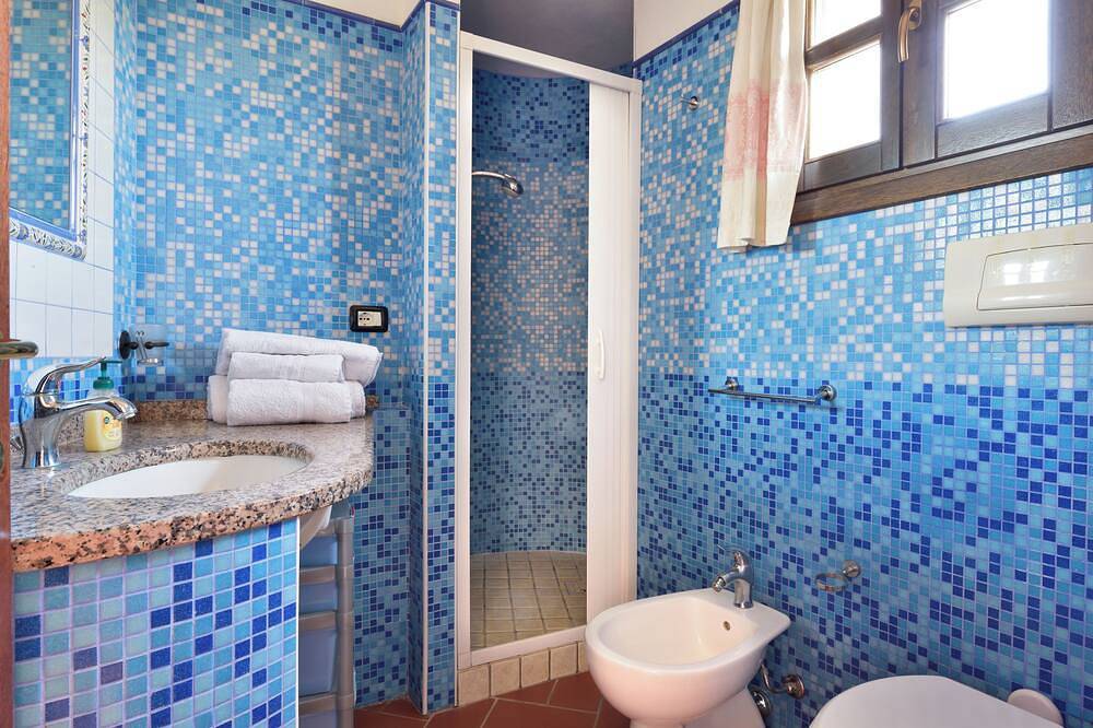 Villa with exclusive garden, 240 meters from the beach, sea and mountain views. in Tancau sul Mare, Lotzorai