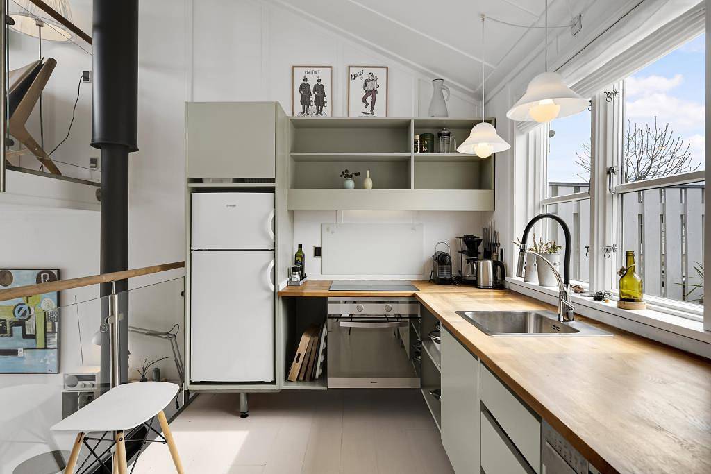 Well-designed two-floor holiday apartment with a lovely view of the marina in Øer Maritime Holiday Village and close to activities, nature and the beach. in Øerne, Ebeltoft