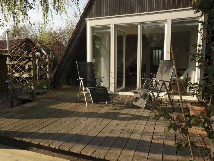 Ferienhaus für 4 Personen, mit Balkon und Terrasse sowie Garten