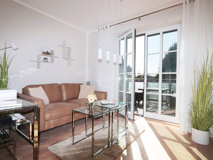 Apartamento inteiro, Apartamento "Kleine Meerzeit Zingst" com lareira, piso radiante, varanda e Wi-Fi in Zingst, Fischland-Darss-Zingst