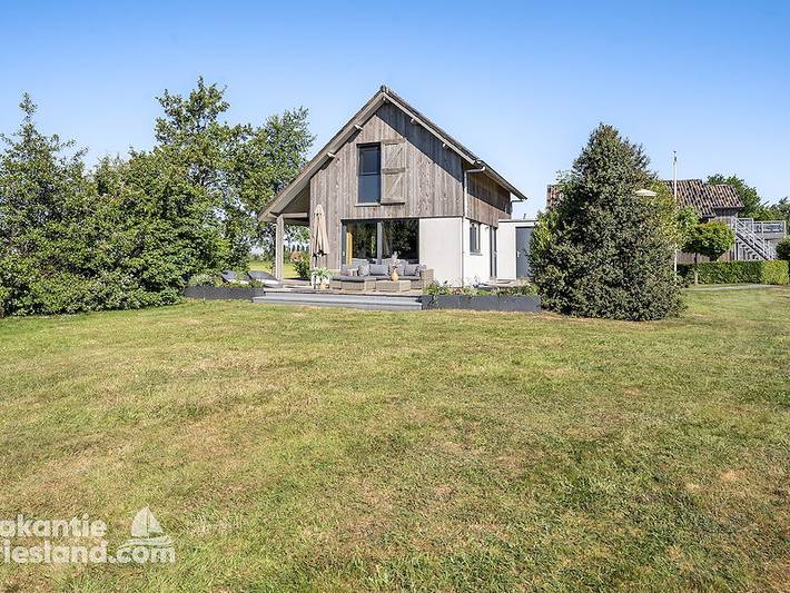 Ferienhaus für 6 Personen, mit Balkon/Terrasse und Terrasse sowie Garten