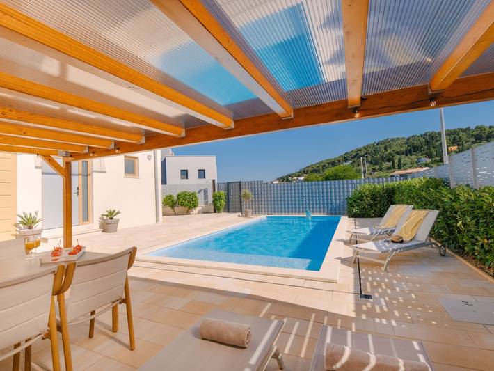 Ferienhaus für 10 Personen, mit Balkon und Terrasse sowie Garten