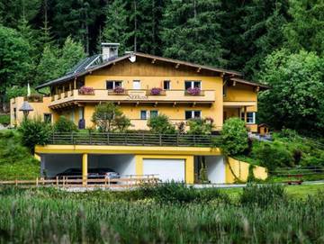 Ferienwohnung für 2 Personen, mit Balkon und Seeblick sowie Sauna und Garten, kinderfreundlich in Seefeld in Tirol