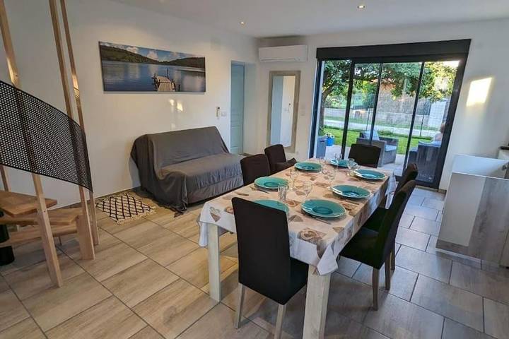 Maison de vacances pour 6 personnes, avec balcon et vue sur le lac ainsi que vue et jardin