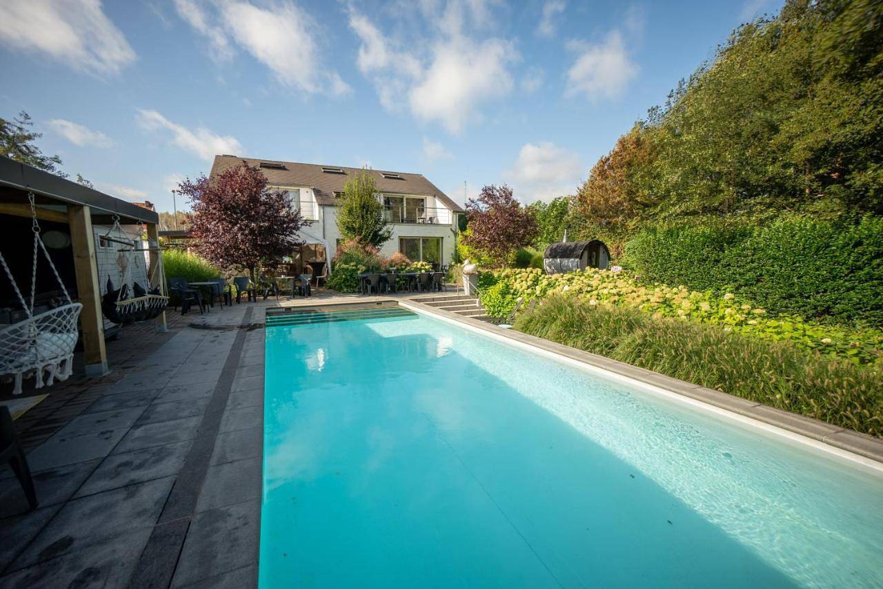 Vakantievilla De Witte Merel voor groepen met zwembad & wellness in Paal, Beringen