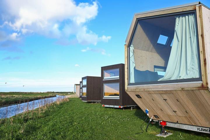 Ferienhaus mit Meerblick für 4 Personen, mit Terrasse und Ausblick in Ostfriesland