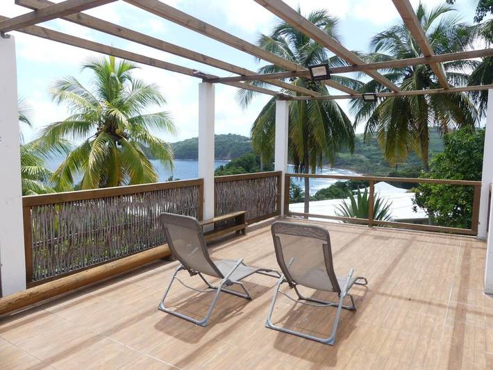 Gîte pour 3 personnes, avec vue et jardin à Le Marigot