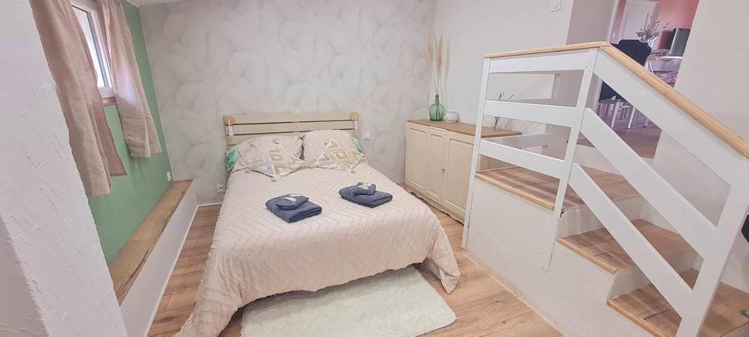 Maison de vacances pour 4 personnes, avec Balcon et Terrasse ainsi que Jardin et Vue sur le lac