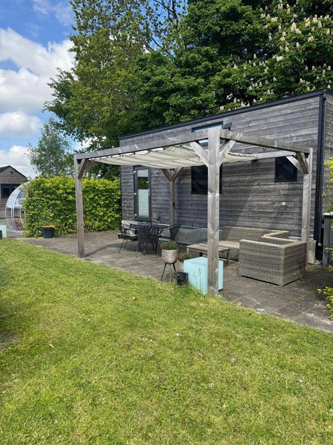 Vakantieappartement voor 2 personen, with uitzicht op het meer and tuin as well as uitzicht in Giethoorn