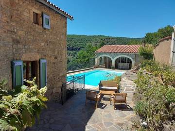 Maison d’hôte pour 2 personnes, avec terrasse et vue ainsi que jardin et piscine à Saint-Rome-de-Tarn